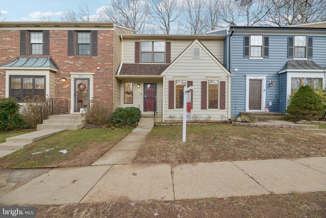 view of property with brick siding