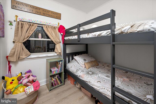 bedroom with hardwood / wood-style floors