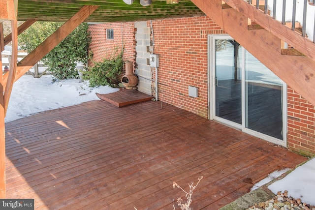 view of snow covered deck