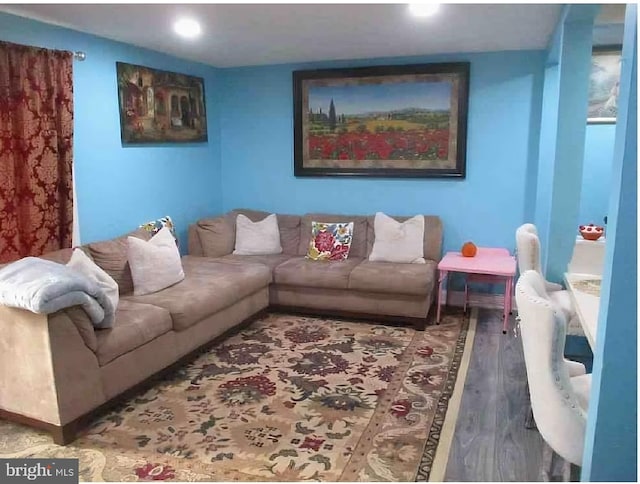 living room with hardwood / wood-style flooring