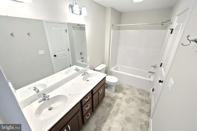 full bathroom featuring vanity, toilet, and bathing tub / shower combination