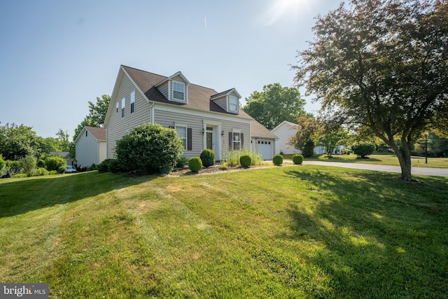 cape cod home with a front yard