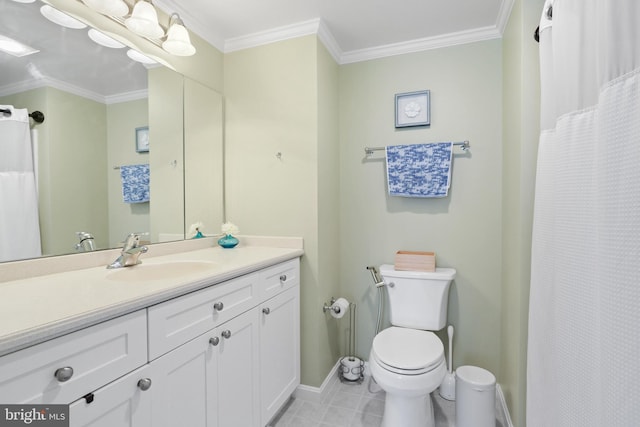 bathroom with vanity, toilet, and crown molding