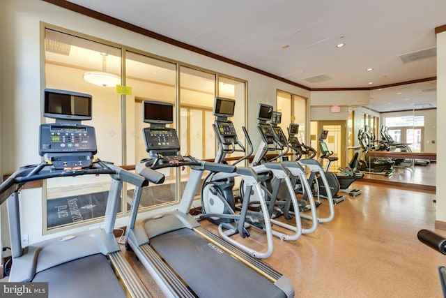 workout area with crown molding