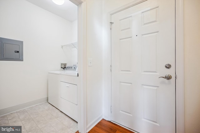 washroom featuring electric panel and washer hookup