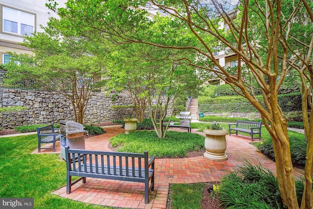 exterior space featuring a yard and a patio area