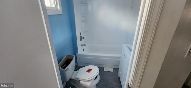 bathroom with tile patterned flooring and toilet