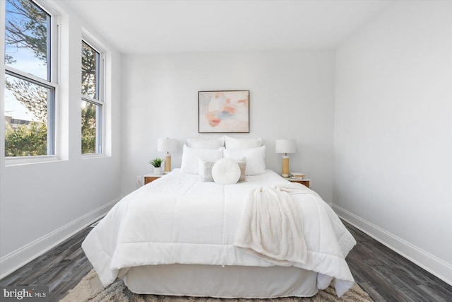 bedroom featuring dark hardwood / wood-style floors