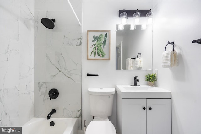 full bathroom with vanity, tiled shower / bath combo, and toilet