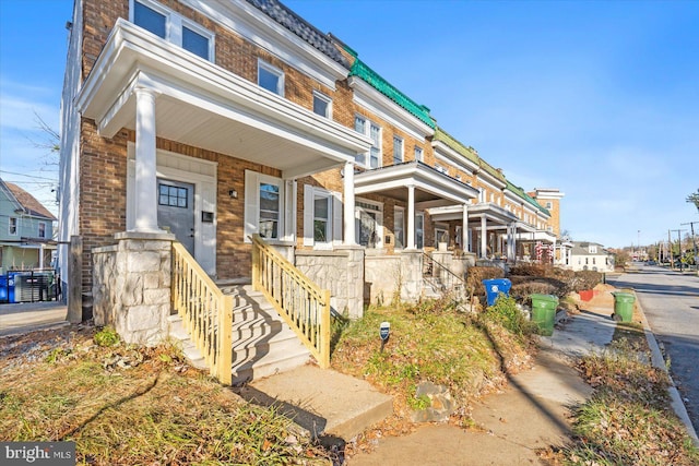 view of front of property featuring covered porch