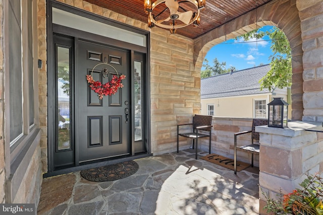 doorway to property with a porch