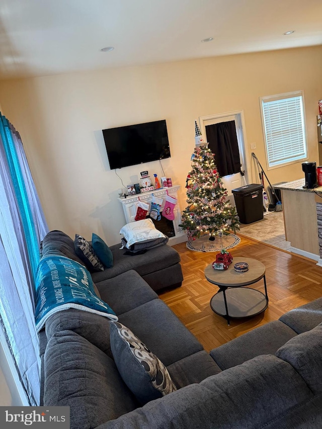 living room featuring light parquet floors