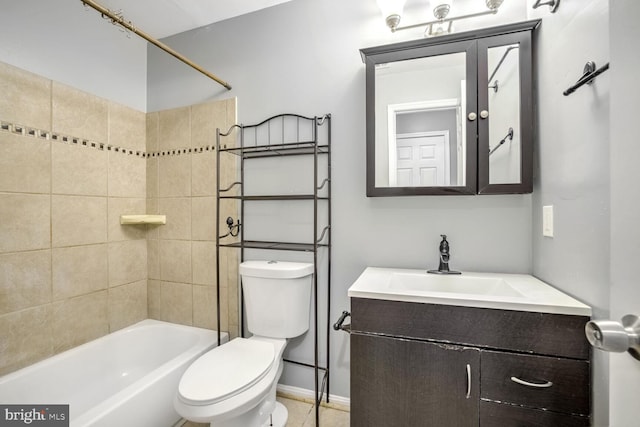 full bathroom featuring vanity, toilet, and tiled shower / bath