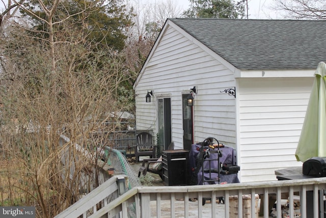 view of side of home featuring a deck