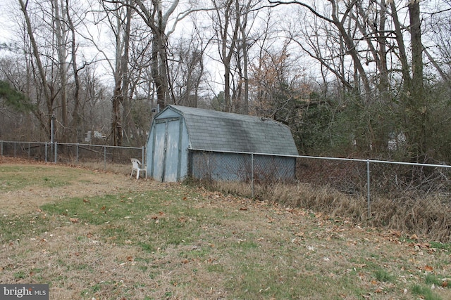 view of outdoor structure with a lawn