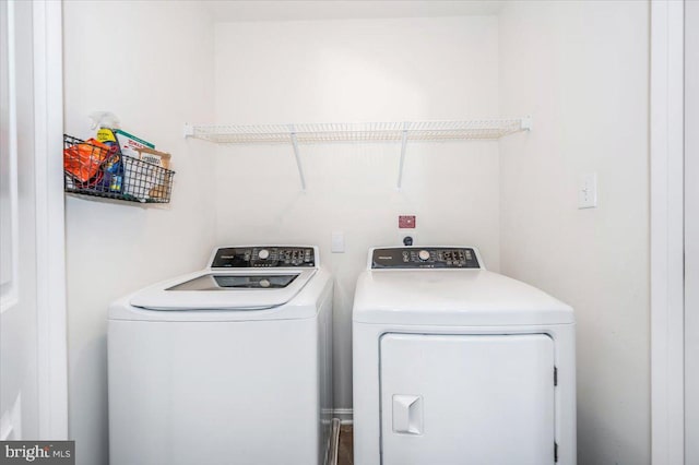 laundry area with washer and clothes dryer