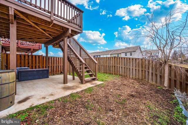 view of yard with a patio area and a deck