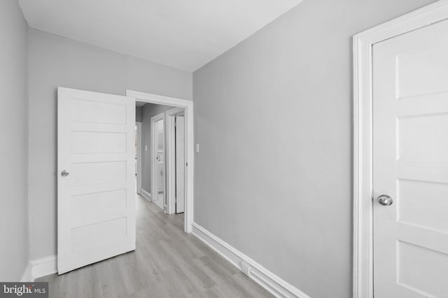 hallway featuring light wood-type flooring