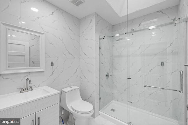 bathroom with a shower with shower door, tile walls, toilet, and vanity