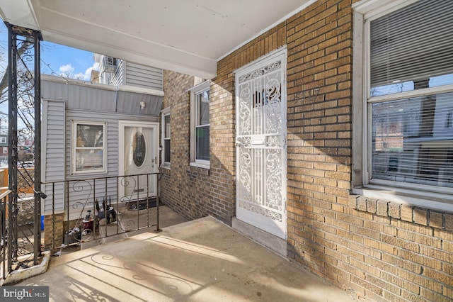 property entrance featuring covered porch