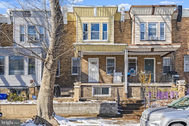 multi unit property featuring covered porch