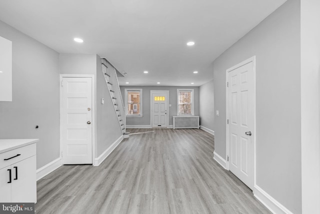 foyer with light hardwood / wood-style flooring