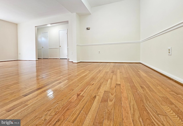 spare room featuring light hardwood / wood-style floors