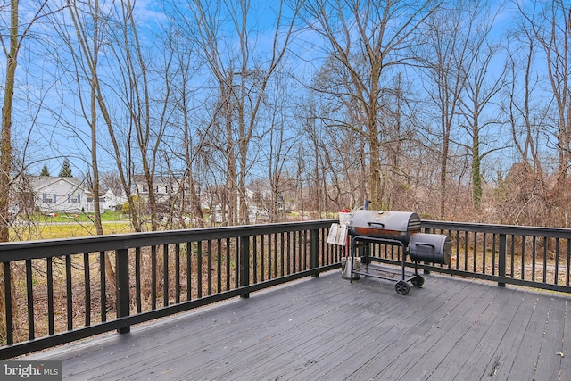 wooden deck with area for grilling