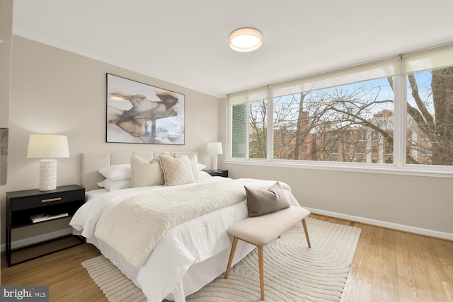 bedroom with wood-type flooring