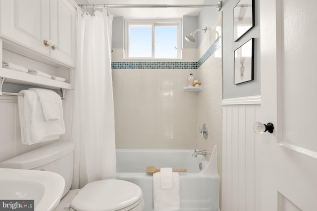 bathroom with toilet and shower / bathtub combination with curtain