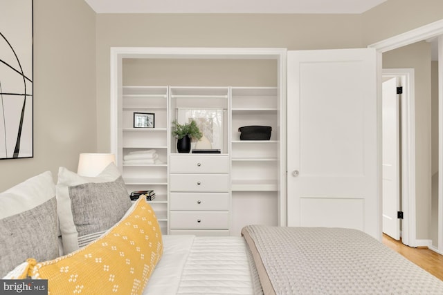 bedroom featuring hardwood / wood-style flooring