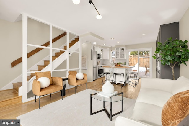 living room featuring light wood-type flooring