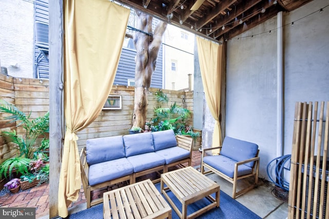 view of patio / terrace with fence and an outdoor hangout area