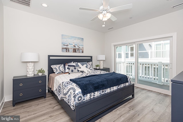 bedroom with ceiling fan, light hardwood / wood-style floors, and access to exterior