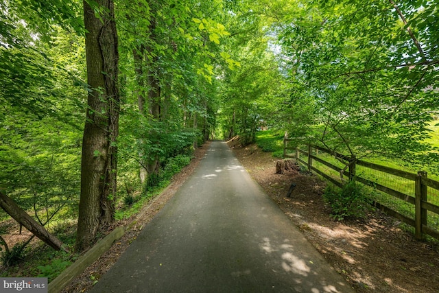 view of street with a wooded view