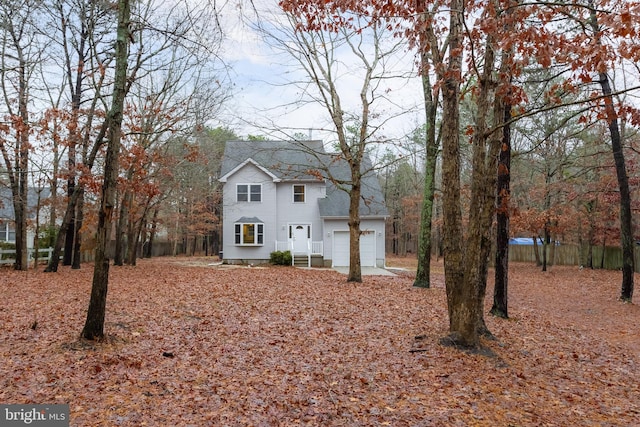 view of property exterior with a garage