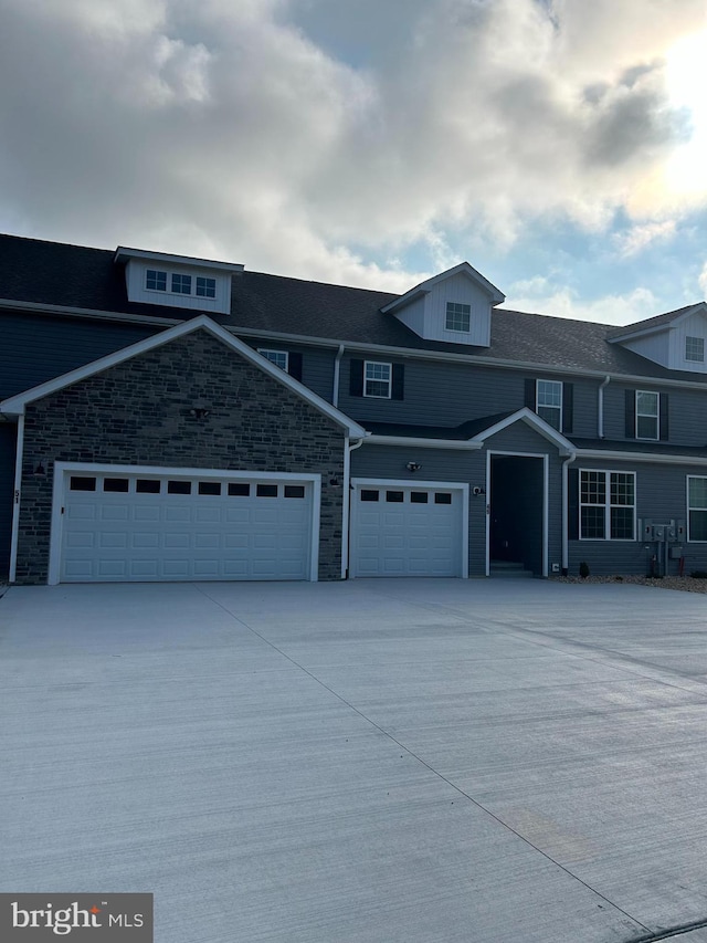 view of front of property featuring a garage