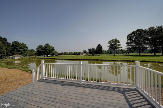 wooden terrace with a water view