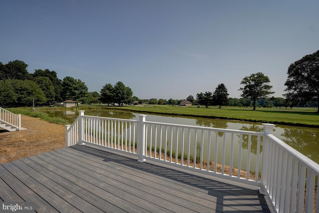 deck featuring a water view