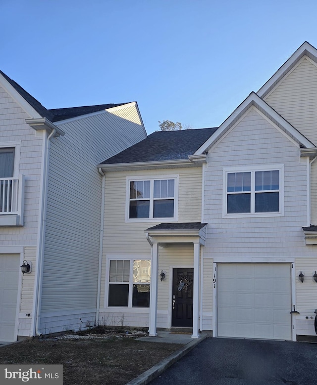 view of front of property with a garage