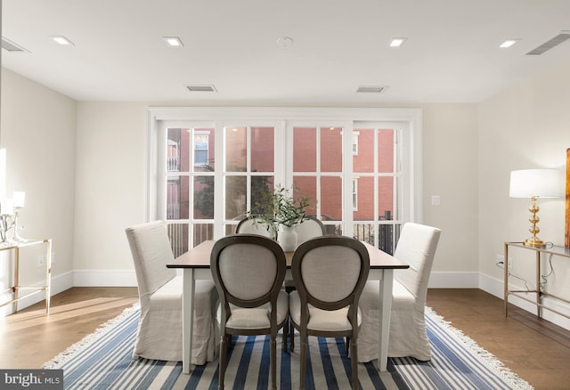 dining space featuring light hardwood / wood-style flooring