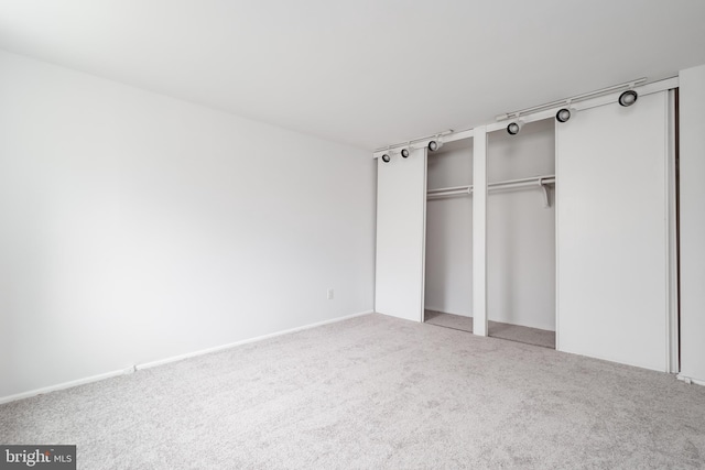 unfurnished bedroom with carpet