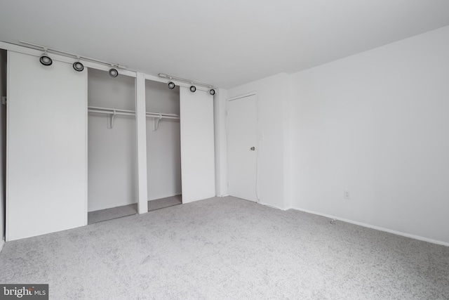 unfurnished bedroom featuring carpet floors