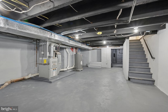 basement with heating unit and water heater