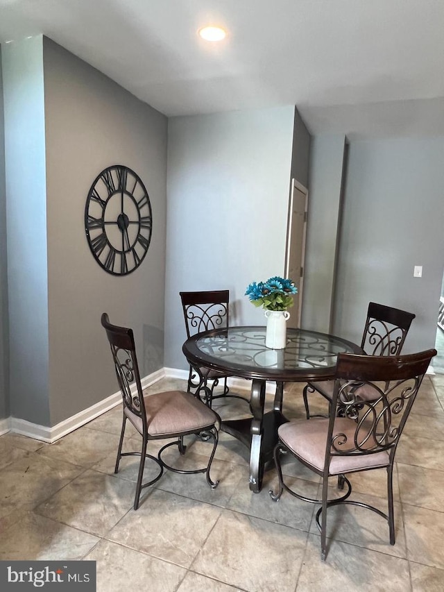 dining area featuring tile patterned floors