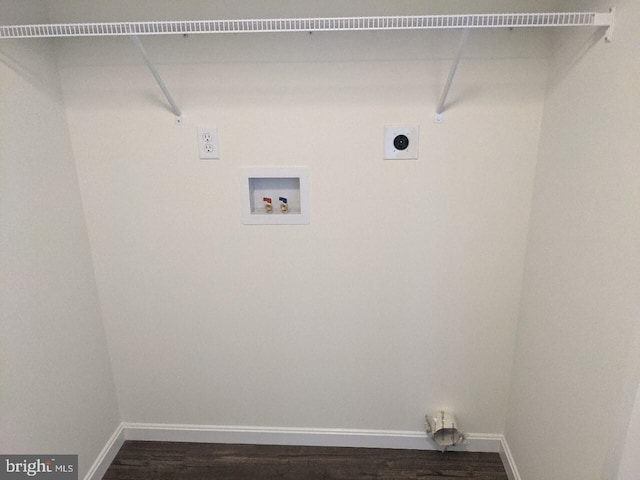 washroom with hookup for an electric dryer, washer hookup, and dark hardwood / wood-style flooring