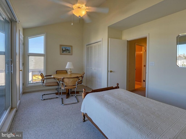 bedroom featuring ceiling fan, a closet, and light colored carpet