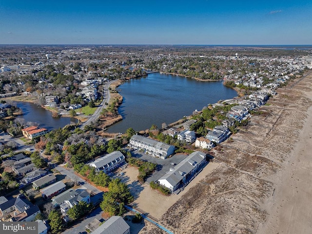 bird's eye view with a residential view and a water view