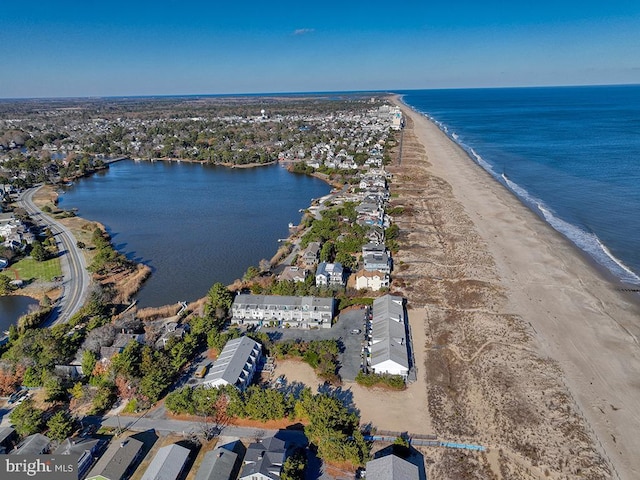 aerial view featuring a water view and a view of the beach