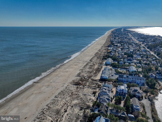 aerial view featuring a water view and a beach view